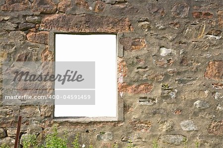 Window frame in ruined wall with isolated cut-out