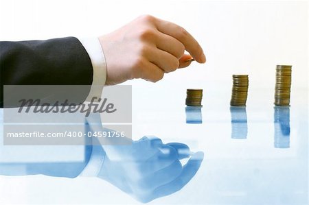 hand make coins piles on white background