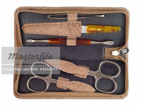 Brown leather manicure kit isolated over white background