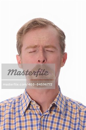Portrait of man crying, on white background