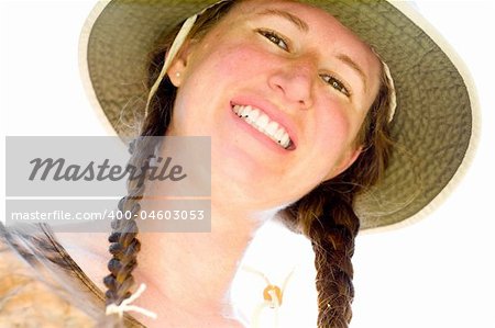 Backlit Smiling Woman in Natural, Outdoor Colors