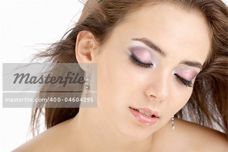 The beautiful sexual woman blindly on a white background