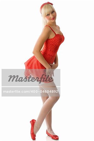 pretty blond pin up in red dress and white stockings taking pose