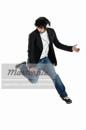 Young modern man jumping over a white background
