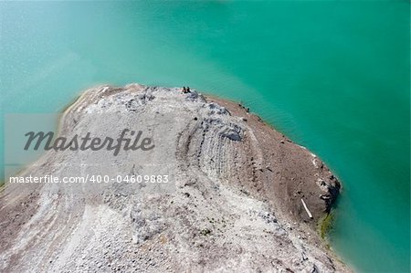 Couple is sitting on an island