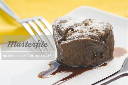 delicious chocolate cake and caramel isolated over white