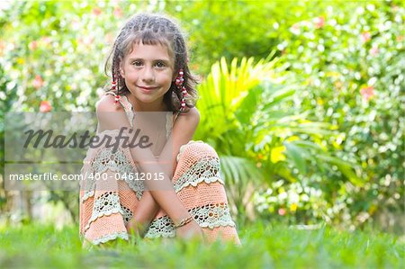 Portrait of little girl having good time in summer environment