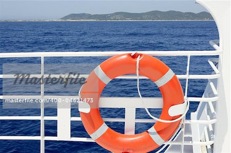 Cruise white boat handrail detail in blue sea and round orange buoy