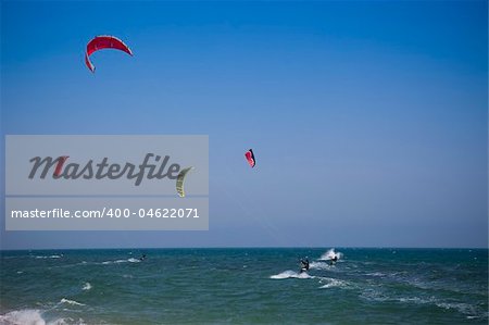 kitesurfers  riding the waves / Black Sea
