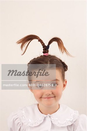 School girl wearing uniform with funny hair style