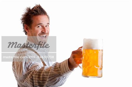Bavarian Man dressed with traditional leather trousers (lederhose) holding Oktoberfest Beer Stein (Mass)