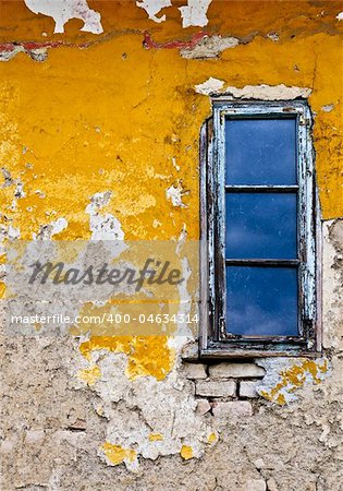 Old weathered painted wall and window for grunge background