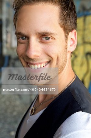 A young attractive man looking at the camera