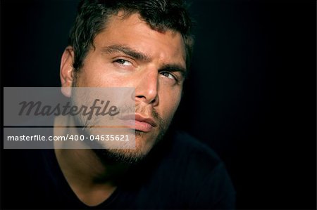 An Attractive Serious Young Man with scruff