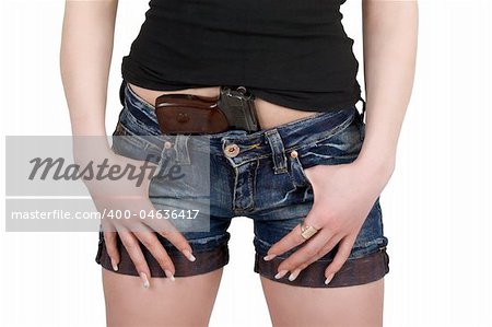 Young woman with pistol. Isolated on white
