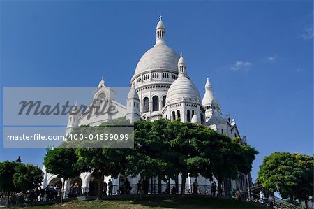 The Sacre Coeur - famous cathedral and popular touristic place in Paris, France