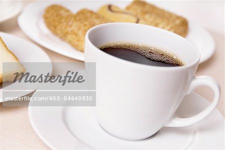 Cup with cafe and biscuits