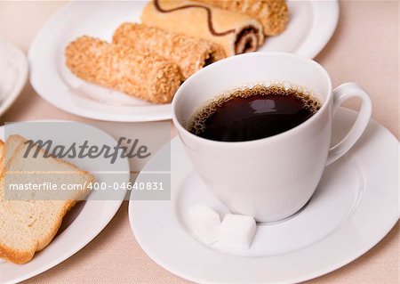 cup with cafe and biscuits