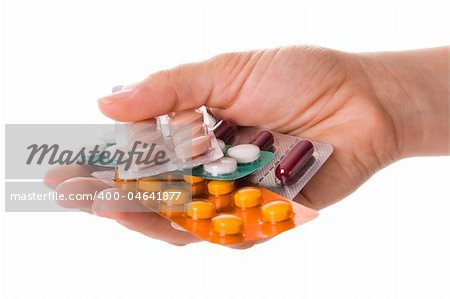 Close-up of a woman hand holding pill tablets