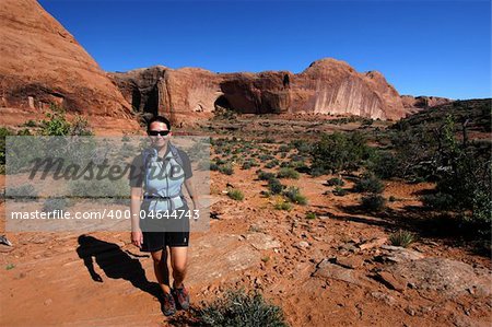 Woman hiking the desert near Moab