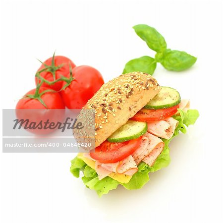 Fresh sandwich with ham and cheese and vegetables