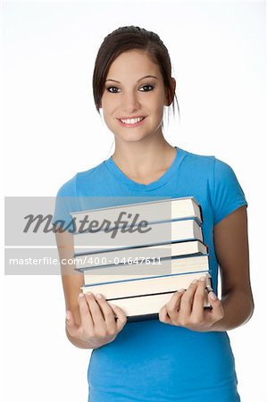 Beautiful Caucasian student with a hand full of books