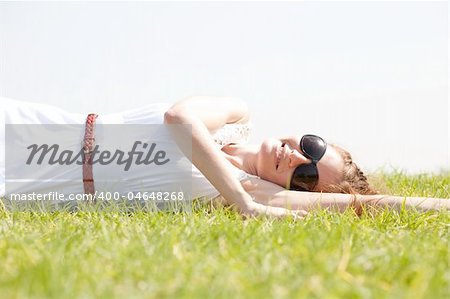 women lie down on grass,Outdoor at park