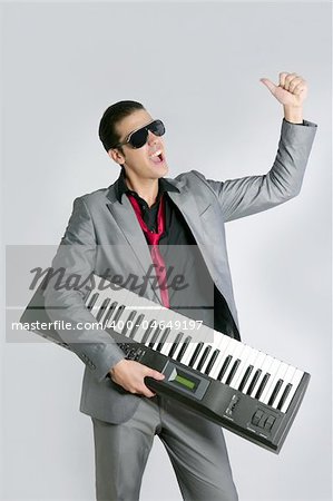 Businessman musician playing instrument with suit and tie