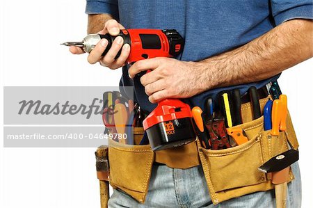 detail on handyman manual worker, toolsbelt and red drill in his hands