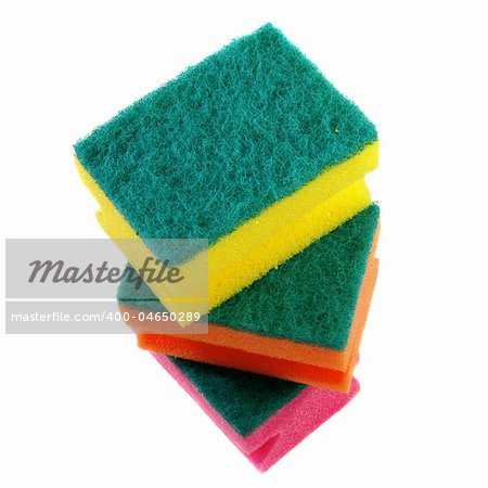 three colorful sponges. Isolated over white.