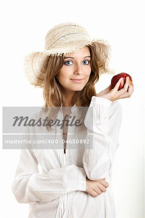 Portrait of a beautiful young woman with a red healthy apple