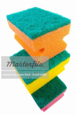 three colorful sponges. Isolated over white.