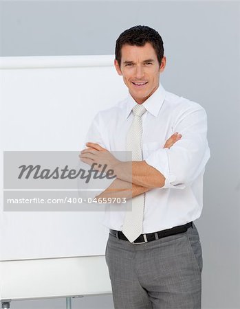 Attractive businessman giving a presentation in the office