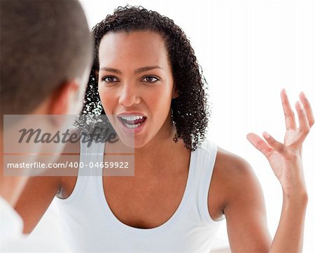 Close-up of a Young couple having an argument in the bedroom