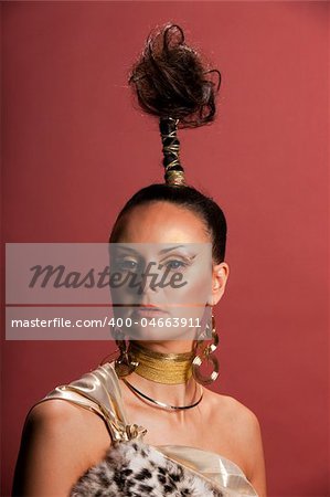 studio shot of beautiful woman in african style