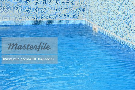 Blue water in swimming pool.