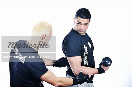 man fitness personal trainer in sport club