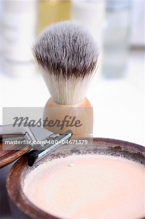 Shaving brush and accessories in the background
