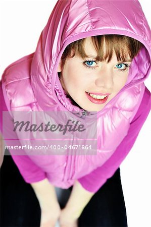 attractive young girl wearing pink jacket and hood