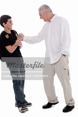 father playing with is son on isolated background