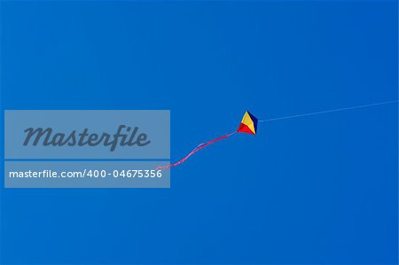 Flying kite in the blue sky