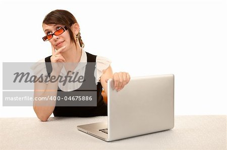 Pretty female office worker with laptop computer