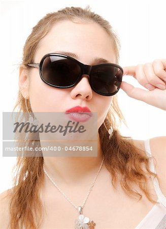 woman wearing her sunglasses. Isolated on white
