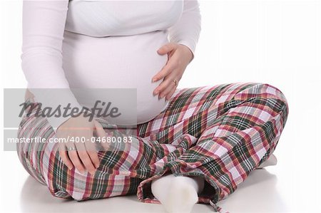 pregnant woman holding belly on white background
