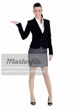 Full length of young woman pointing copysapce over white background