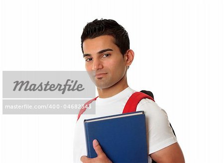 Student wearing a backpack and carrying a book