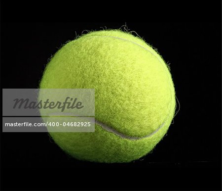 fine closeup image of classic yellow tennis ball