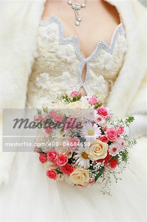 The bride with a wedding bouquet