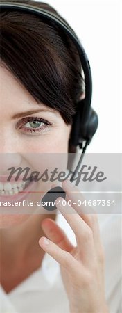 Attractive customer service agent with headset on isolated on a white background