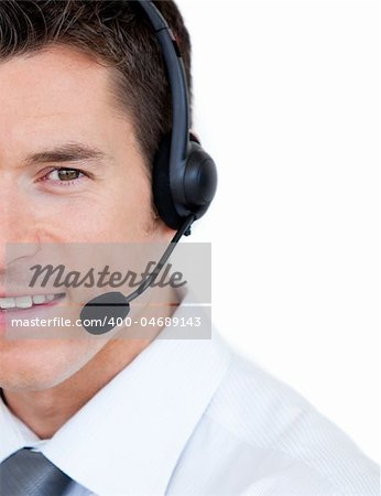 Portrait of a sales representative man with an headset against white background